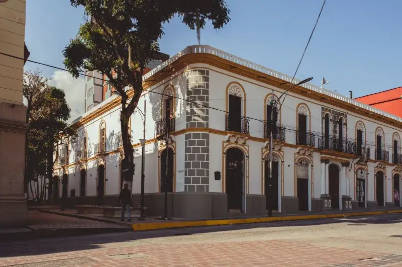 Beautiful colonial architecture with bright sunlight in Mérida, Venezuela capturing the essence of South American heritage.