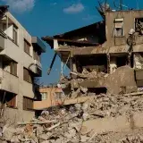 Damaged buildings from earthquake in Antakya, Turkey. Structural collapse and debris.