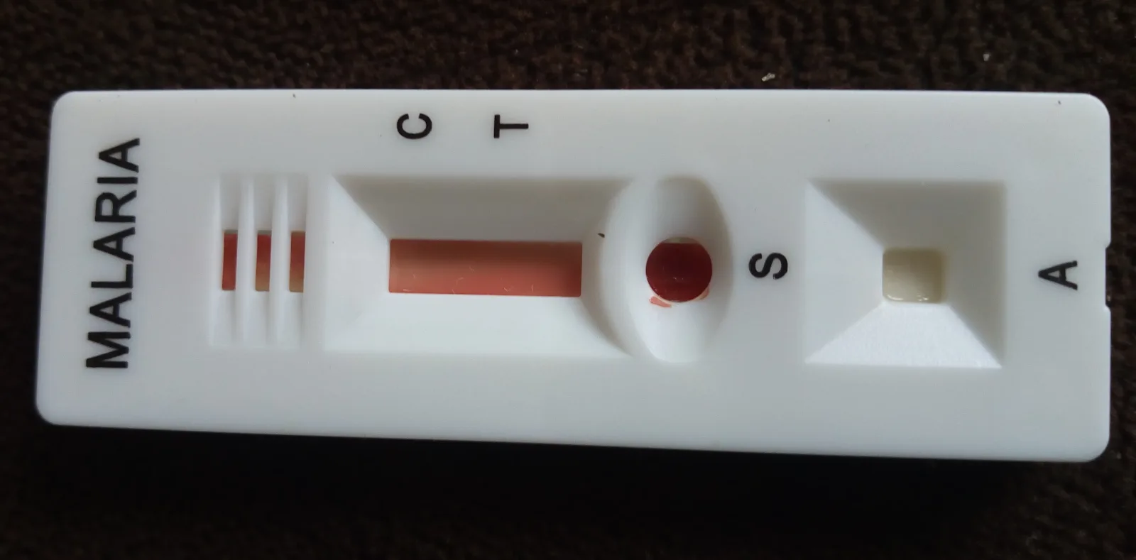 File:Dispositif de test de dépistage rapide résultat positif pour le paludisme(malaria) 01.jpg
