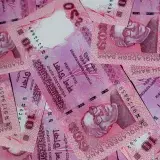 Detailed close-up of pink Bangladeshi 10 Taka banknotes in Gazipur, Bangladesh.