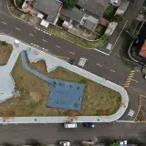 Drone shot of a road intersection and park in Parque das Industrias, Brazil.