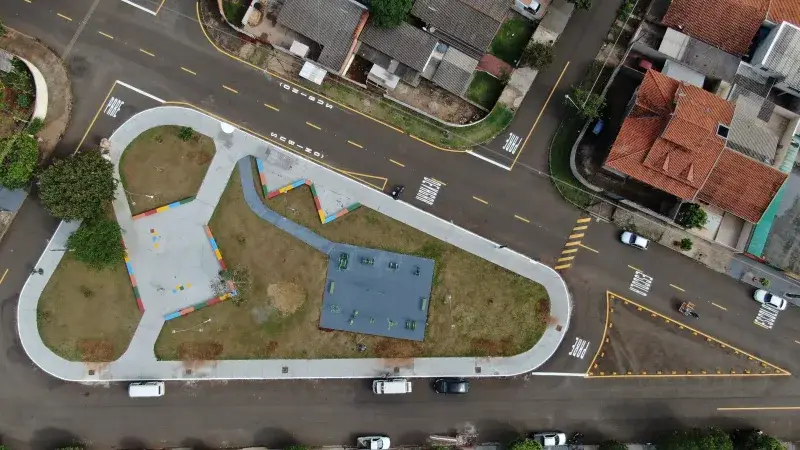 Drone shot of a road intersection and park in Parque das Industrias, Brazil.